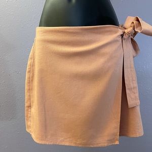 Cute wrap pink skirt.  Lightly worn, great condition!